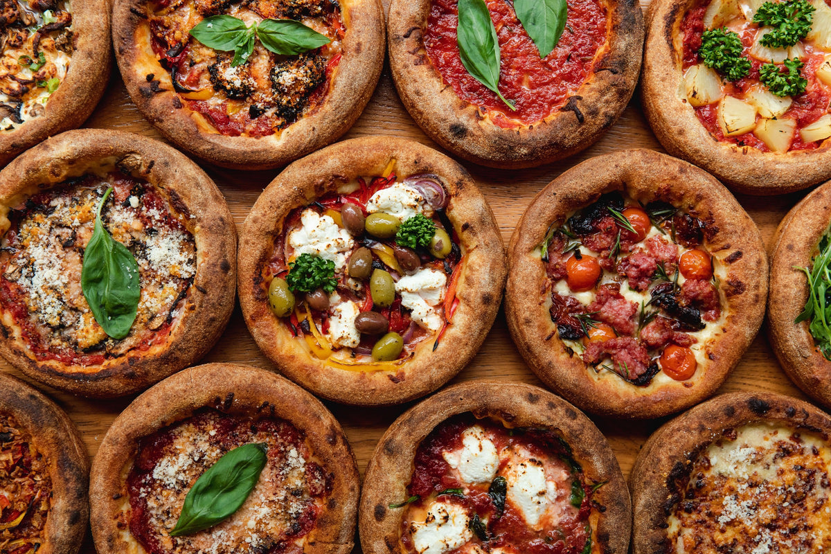 A selection of Japes Chicago Style deep dish pizzas with different toppings